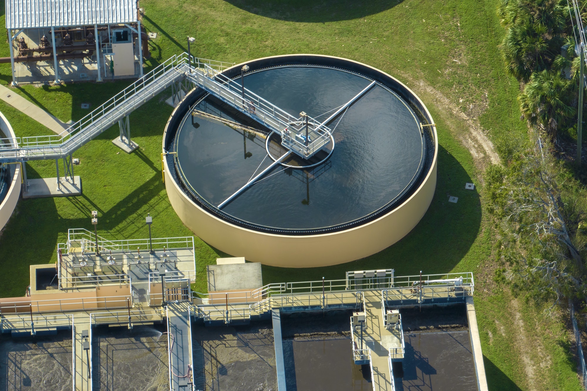 Aerial view of modern water cleaning facility at urban wastewater treatment plant.