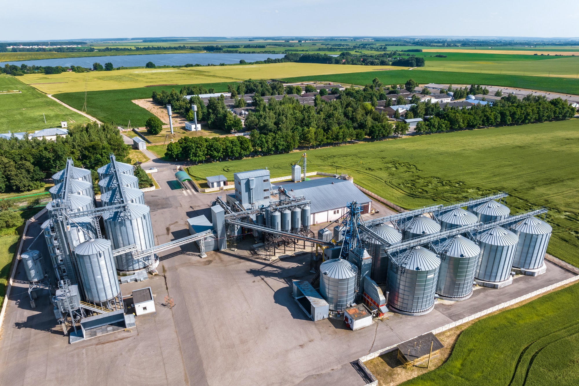 aerial view on agro silos granary elevator on agro-processing manufacturing plant